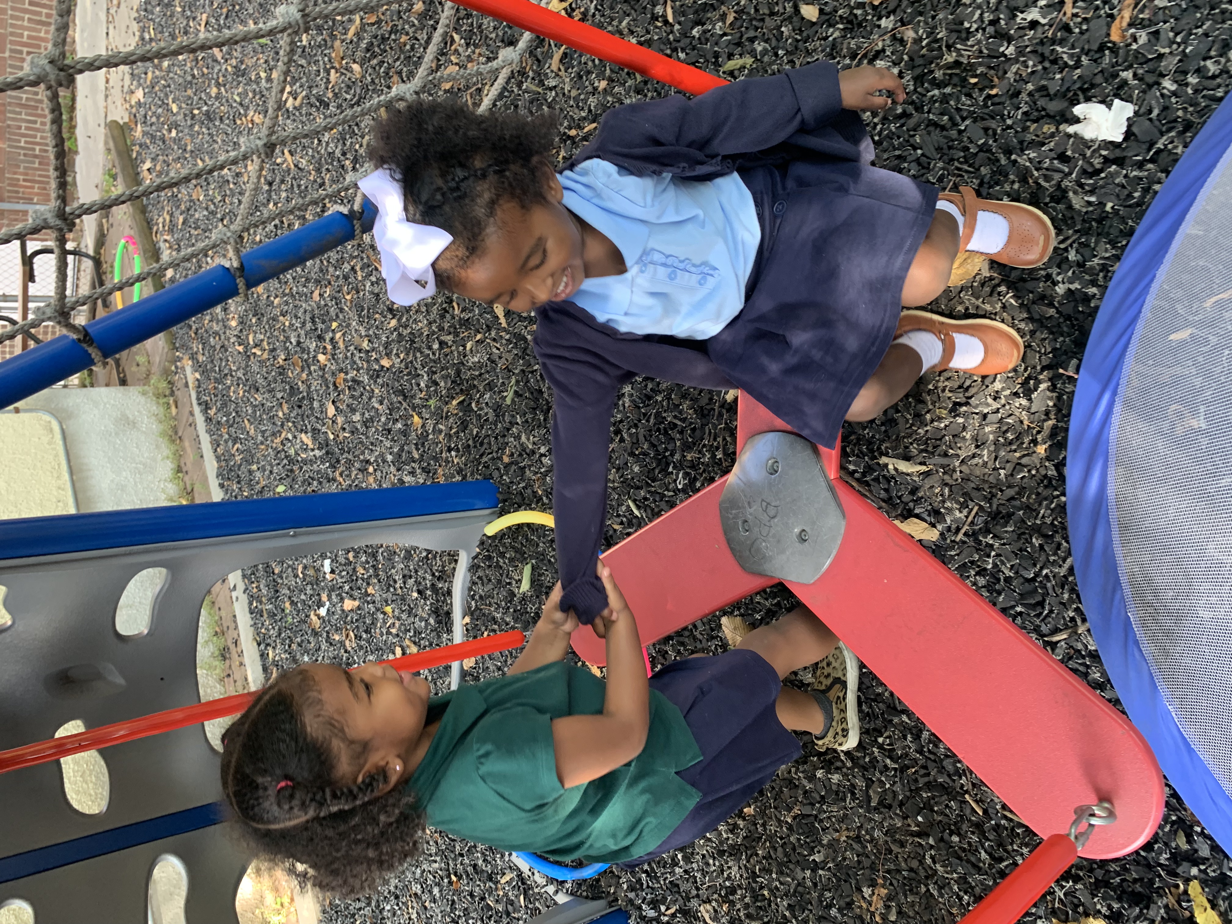 Children playing outside together on a sunny day